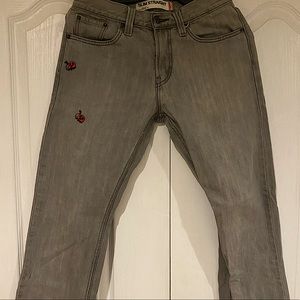 Ladybug Patch Gray Levi’s Jeans